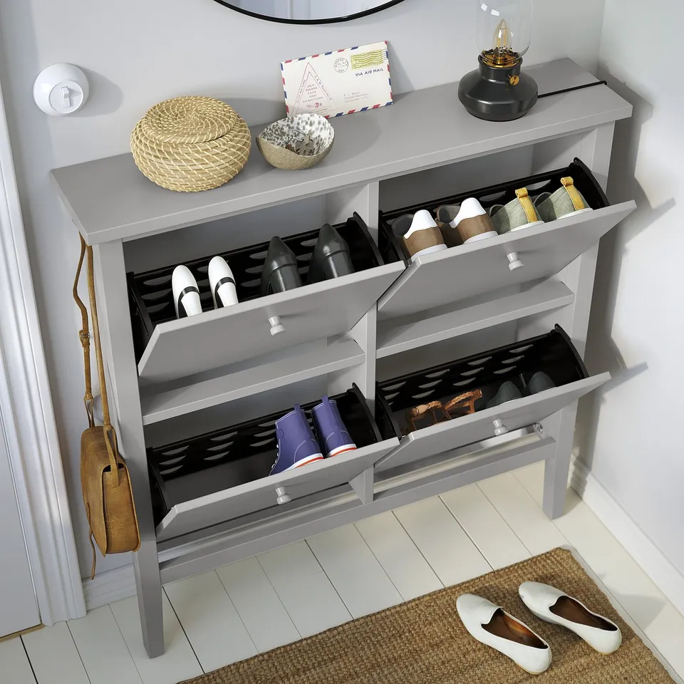 Grey GULLABERG shoe cabinet stores 8 pairs, traditional design with 4 compartments, wooden knobs, single hooks on either side.