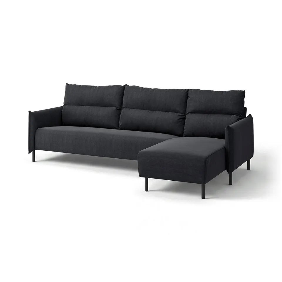 An l-shaped charcoal grey MANNARP sofa with a sleek, modern design and comfortable cushions.