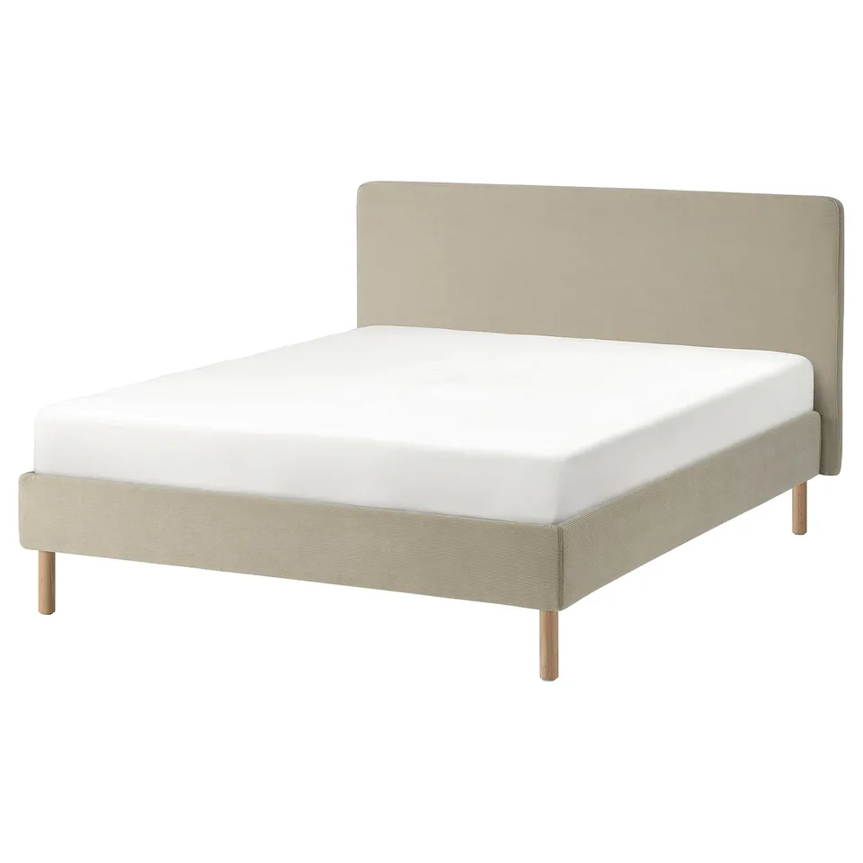 TÄRNKULLEN bed, beige, upholstered with wooden legs, rectangular shape, soft headboard.