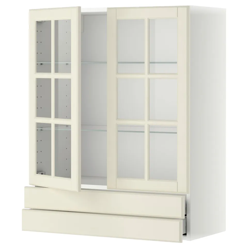 Off-white kitchen cabinet with glass doors, metal drawers, and wooden frame, traditional design.