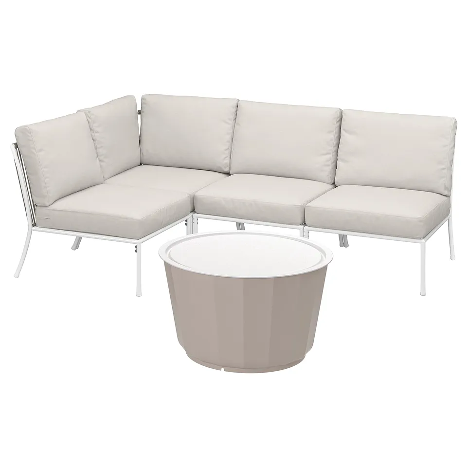 Modern outdoor sectional sofa in white, with light grey cushions and a round coffee table.