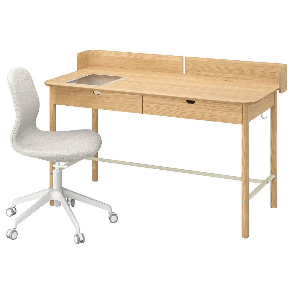 Wooden light brown desk with drawers and a beige chair with wheels. Modern, functional workspace.