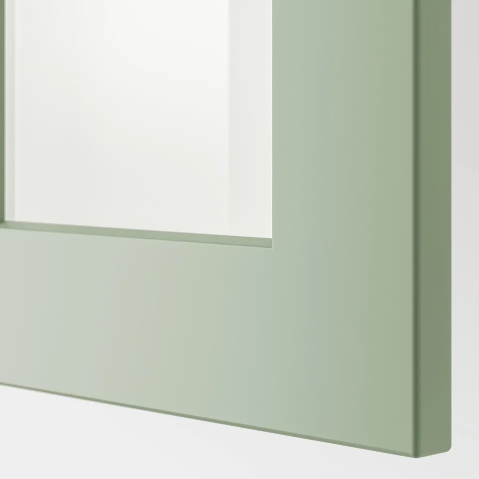 Modern green framed glass kitchen cabinet; sleek, sturdy, and likely part of a high-quality METOD system.
