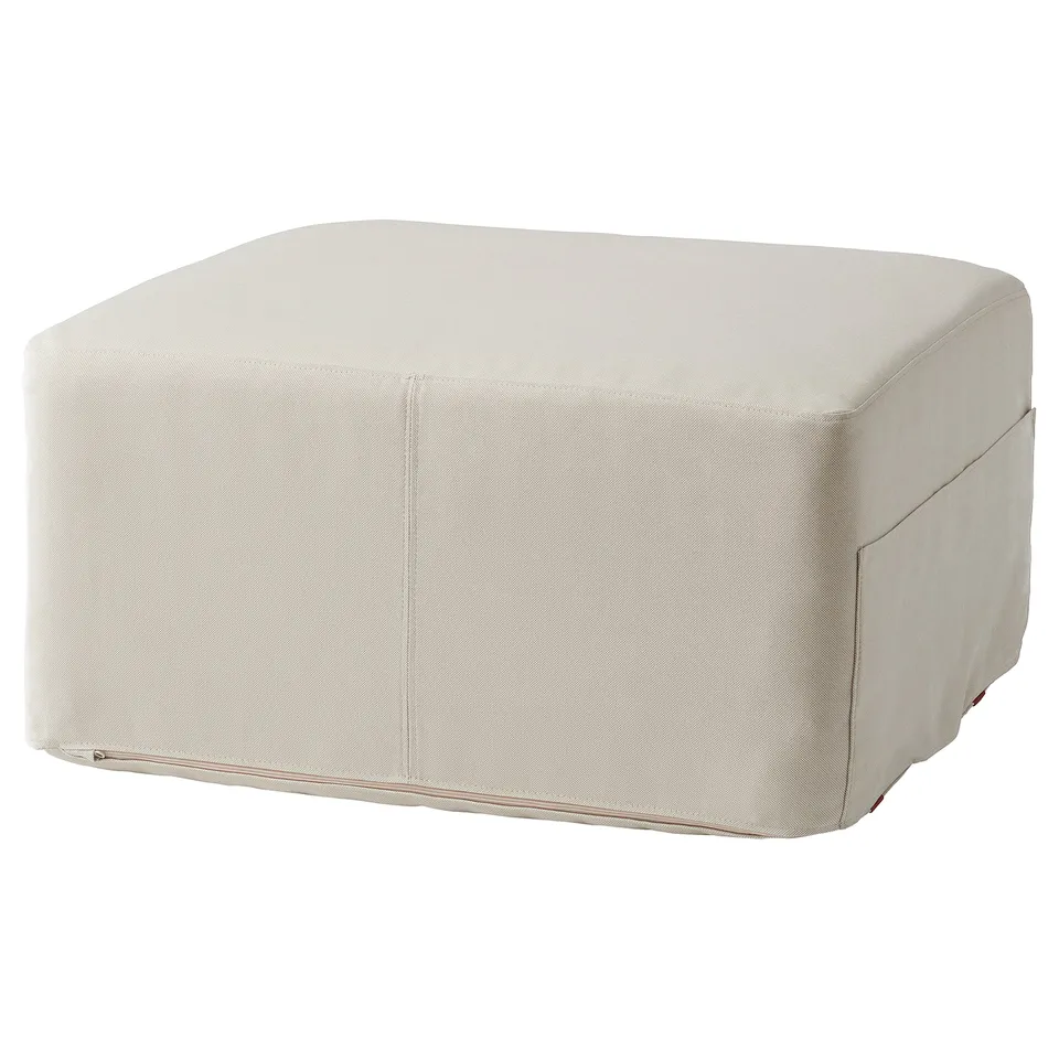 The KOMPISHÄNG is a square-shaped ottoman, beige in colour, made of recycled polyester, featuring clean lines and a simple, modern design.