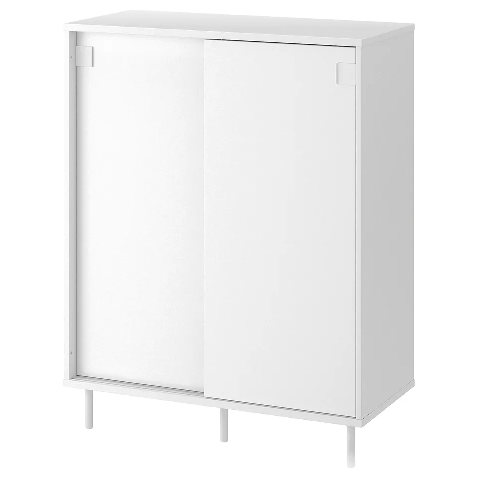 White mackapar cabinet, rectangular, sliding doors.