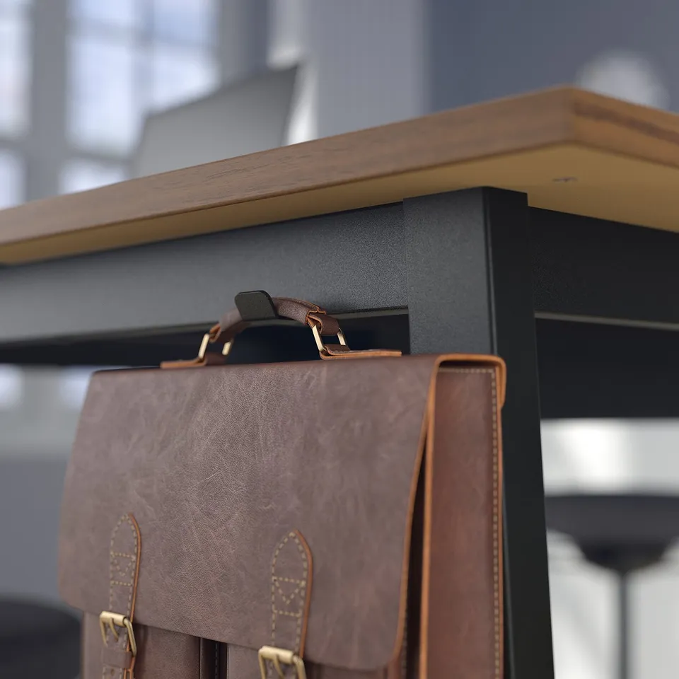 Briefcase hangs on black tables hooks; wooden top visible.