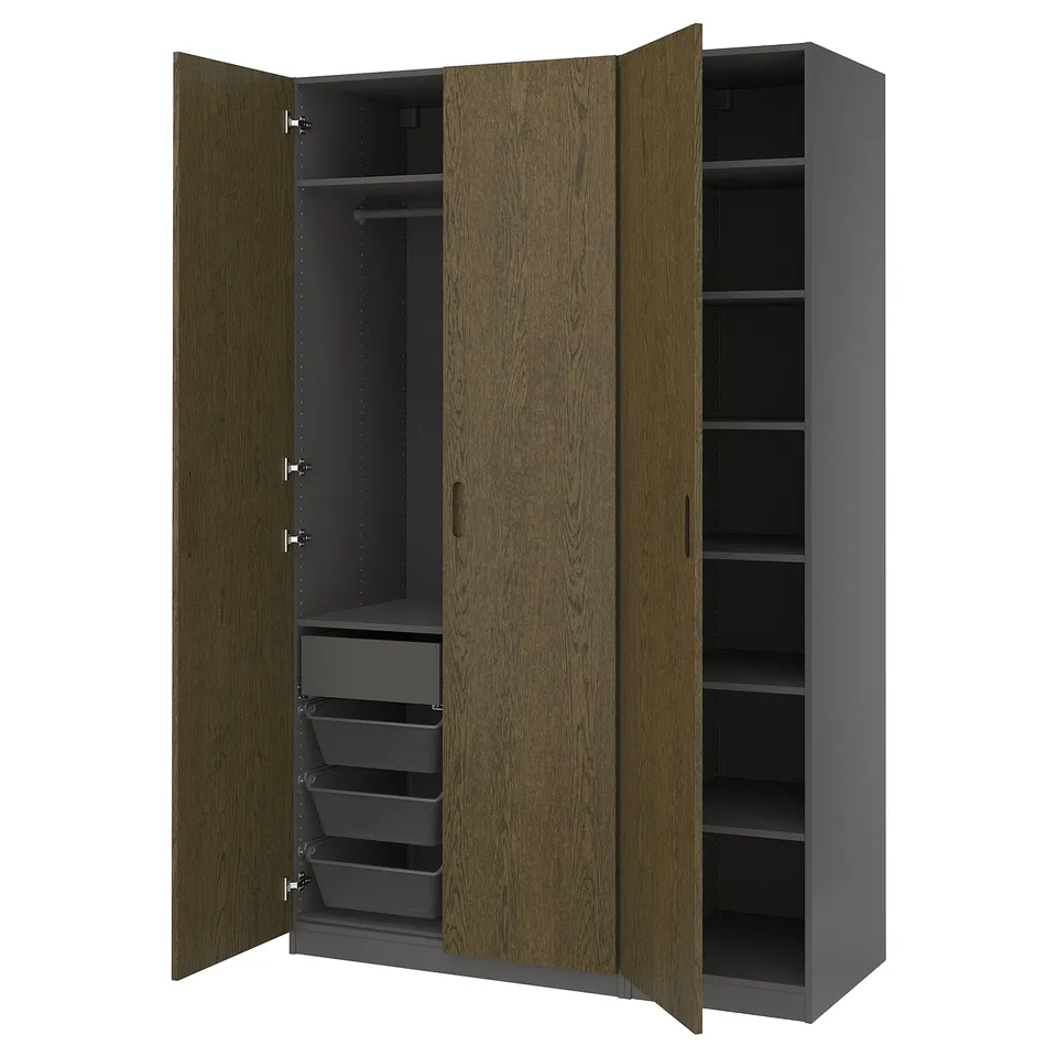 A PAX wardrobe with dark brown wooden doors, featuring shelves and drawers inside. It has a modern, sleek design.