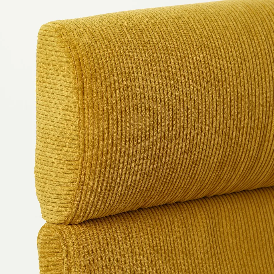 Mustard-yellow POÄNG chair, showcasing high-quality, durable corduroy fabric with smooth lines and comfortable design.