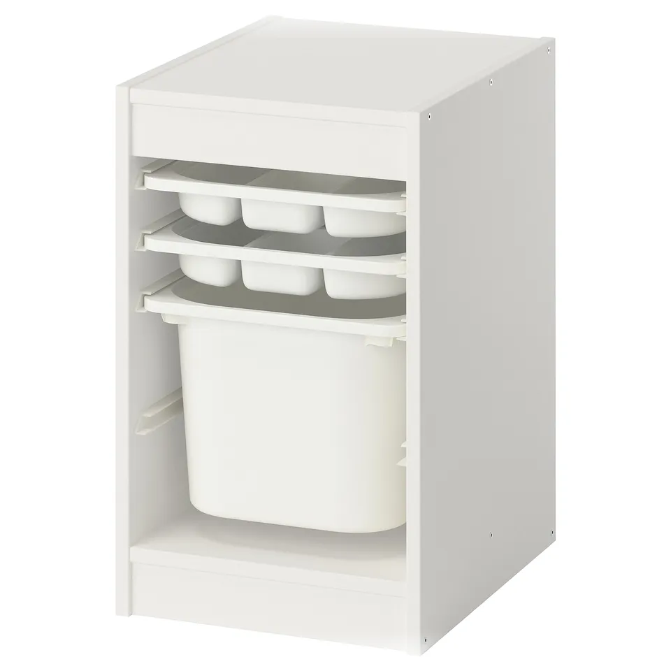 TROFAST white kids storage unit with trays and bin.