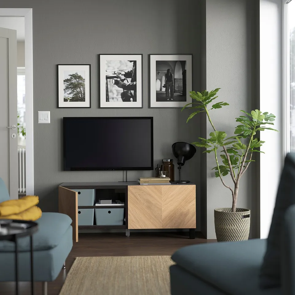 Modern tv unit with adjustable shelves, cable management, and soft-closing hinges. Gain storage and hide cables. Suitable for a tv up to 45 inches.