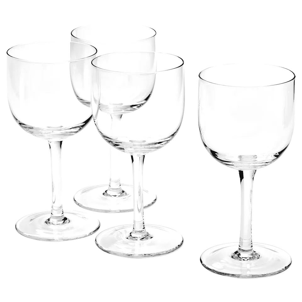 Four clear, mouth-blown wine glasses with sleek lines and flat bases, part of the STOCKHOLM 2025 collection, elegantly displayed.