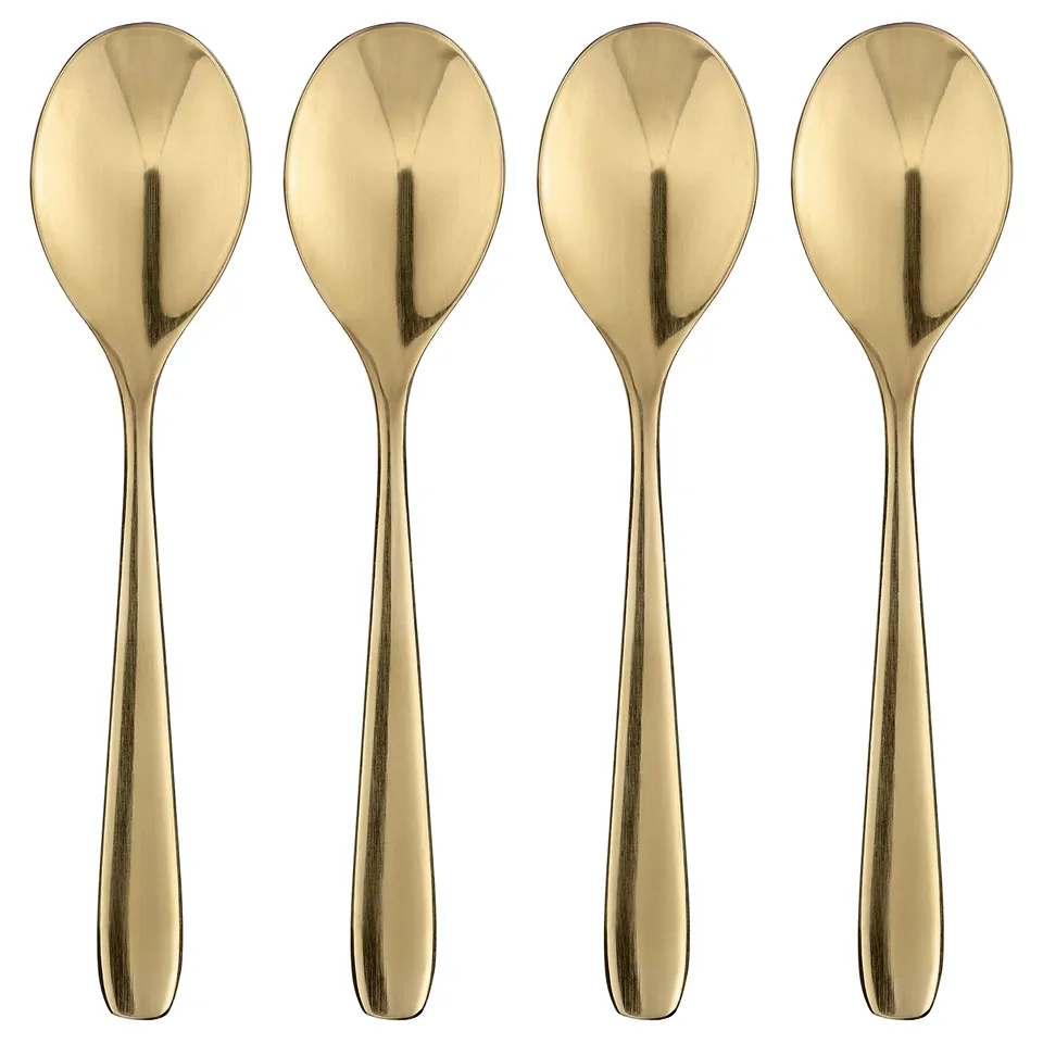 Four elegant golden spoons arranged neatly, reflecting light, with sleek handles and rounded bowls, perfect for dessert.