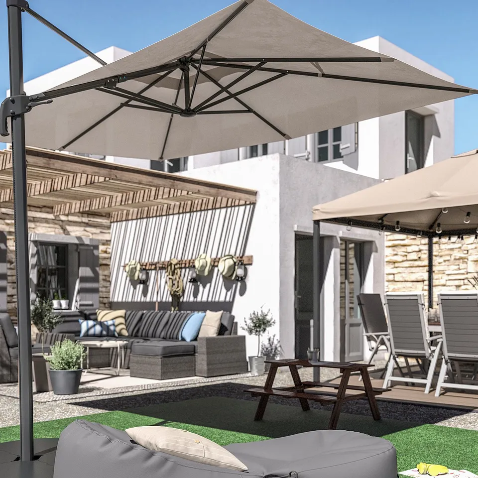 Backyard scene with large beige umbrella shading a grey inflatable pool float on green artificial turf, near a wooden pergola and outdoor furniture.