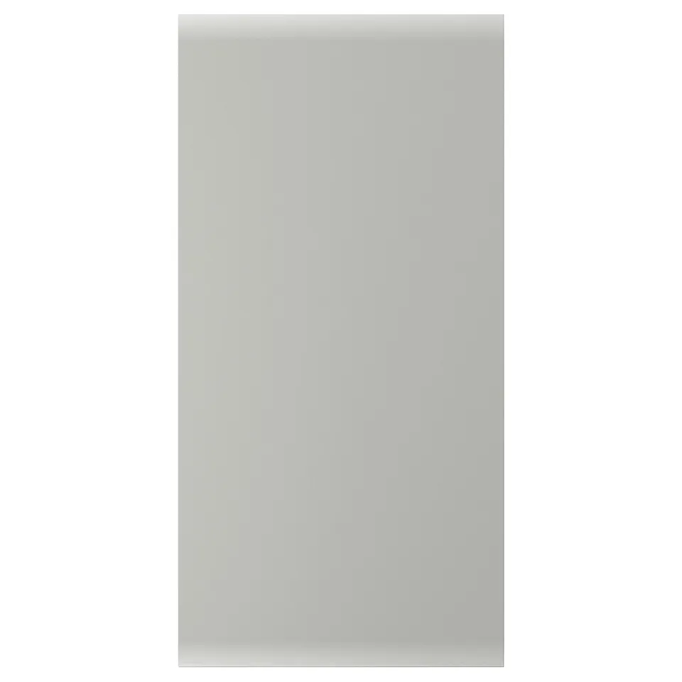 A light grey, rectangular HAVSTORP kitchen cabinet front, smooth and minimalist.