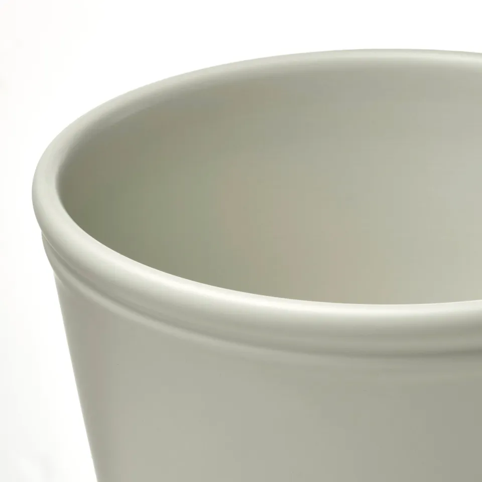 White vase, smooth, rounded rim.