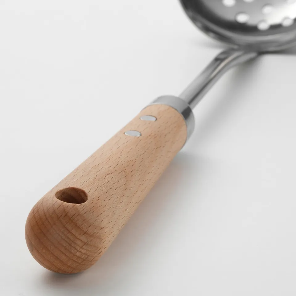 Wooden-handled skimmer with metal strainer, crafted for secure grip and lasting durability.