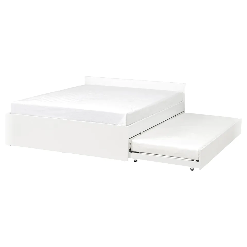 Simple white bed frame with trundle. Modern design, clean lines. Ideal for extra guest space.