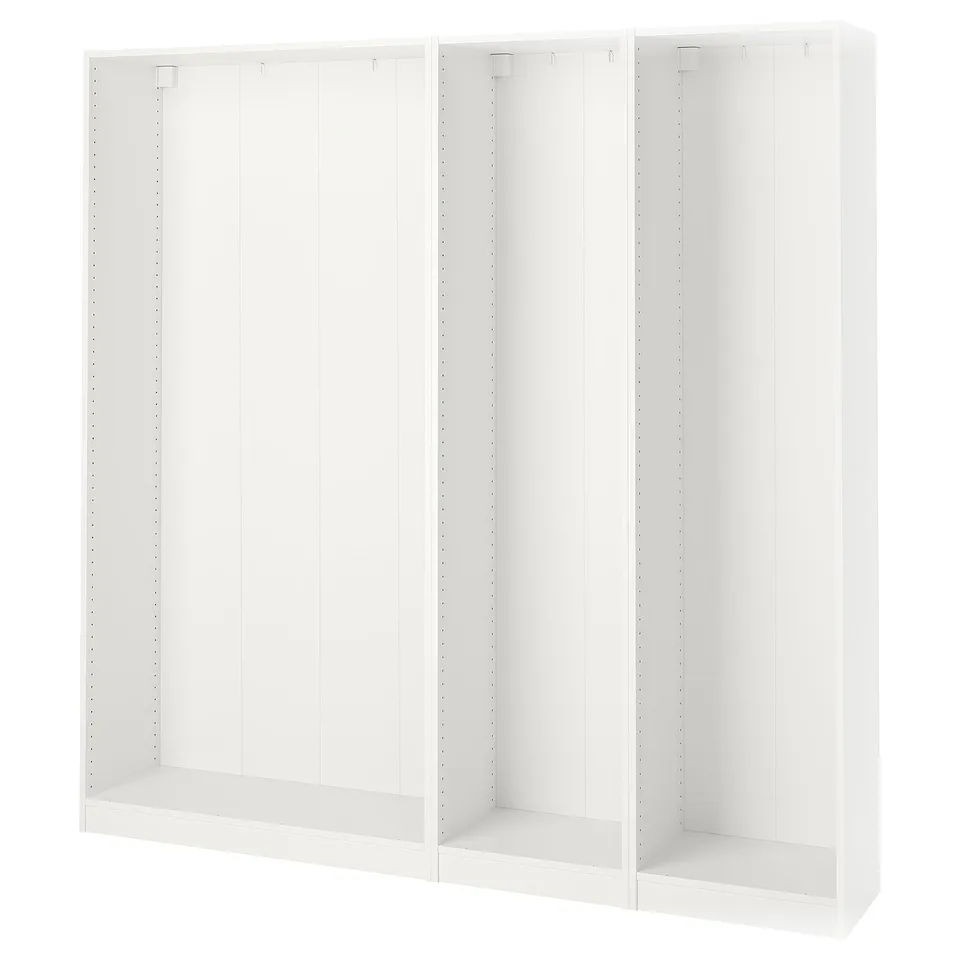 Three white PAX wardrobe frames with adjustable feet for versatile use.