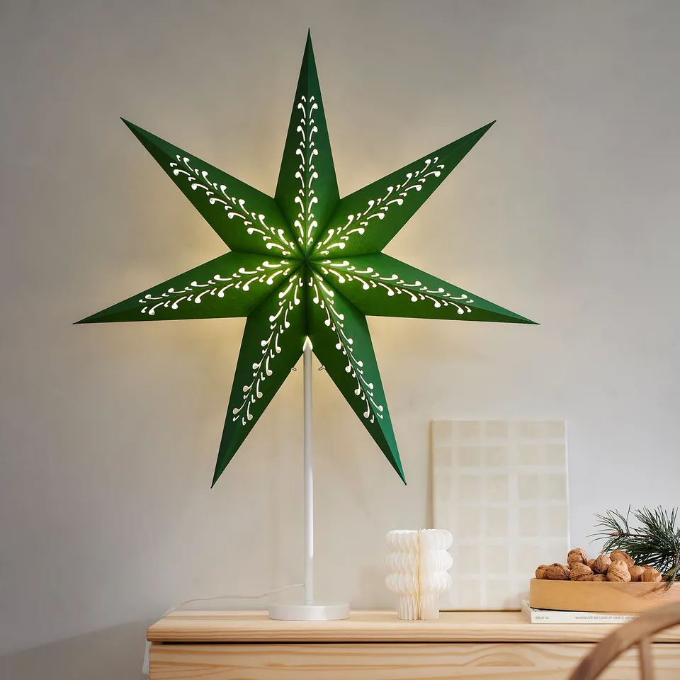 STRÅLA: green star-shaped lamp, paperboard & metal, fits on table, warm glow, decor item.