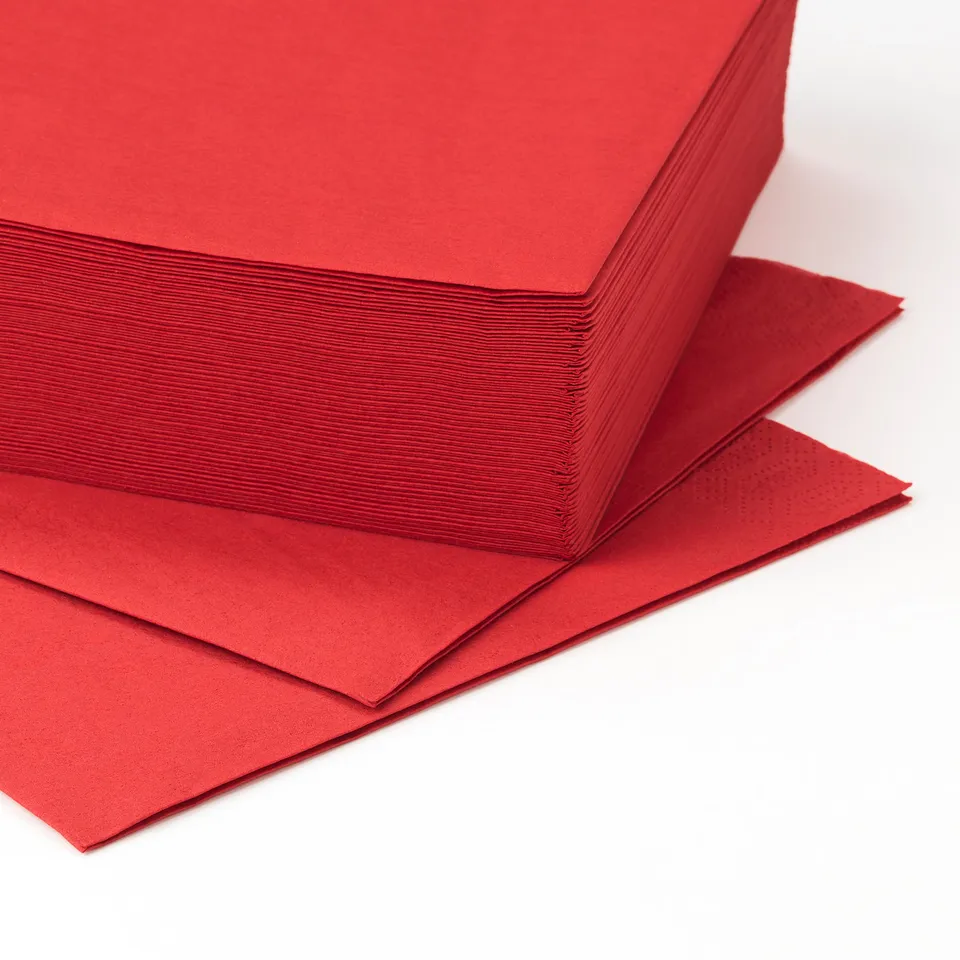 A stack of bright red, smooth, and neatly folded papers.