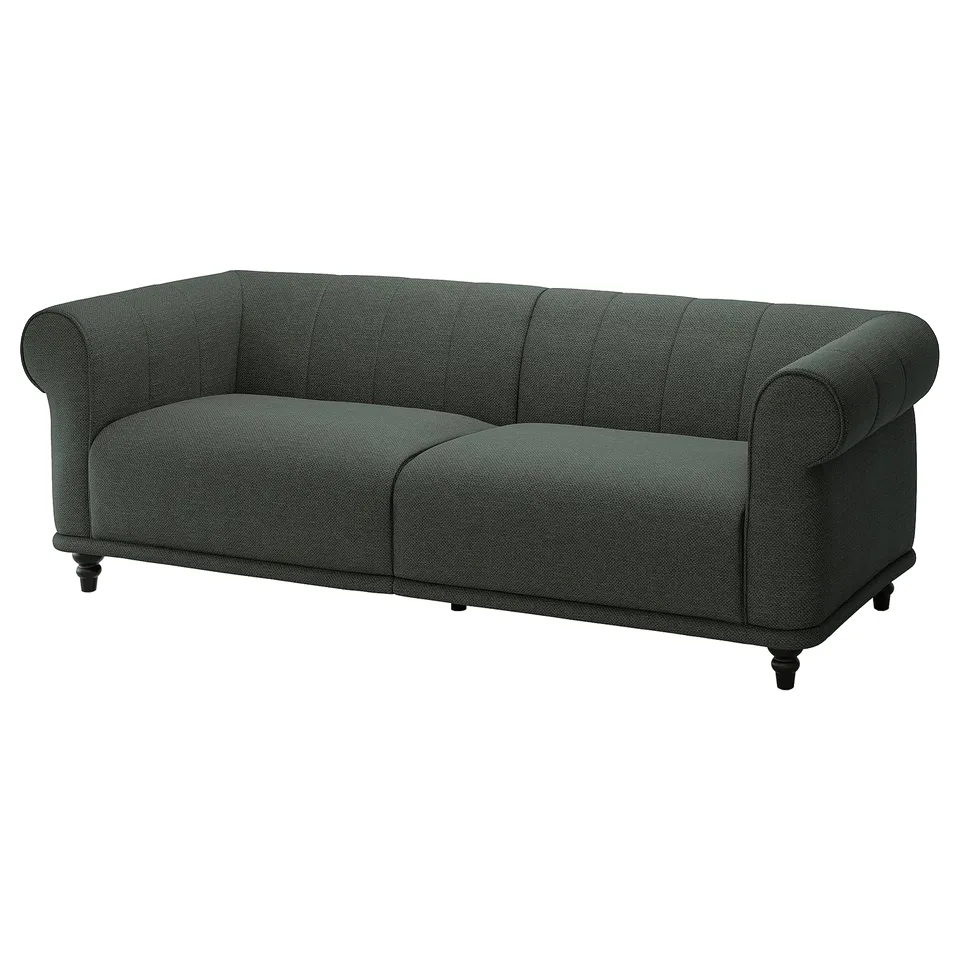 VISKAFORS: classic dark green sofa, soft rounded shapes, deep cushions, wooden legs.