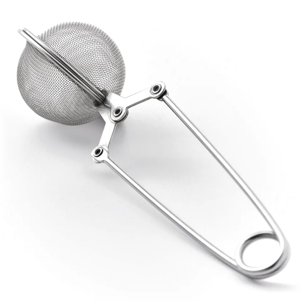 Metal tea infuser with spherical mesh philtre and long handle, designed for ease of use.