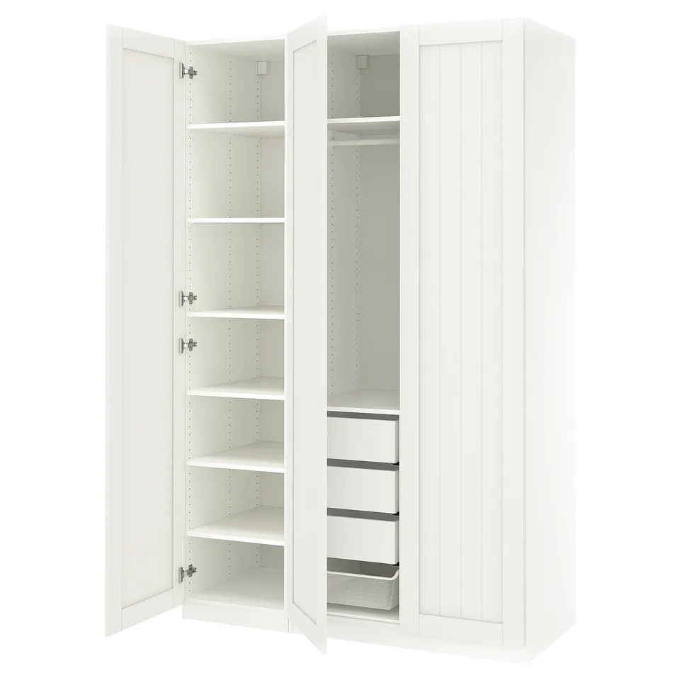 White PAX wardrobe with open doors revealing shelves and drawers.