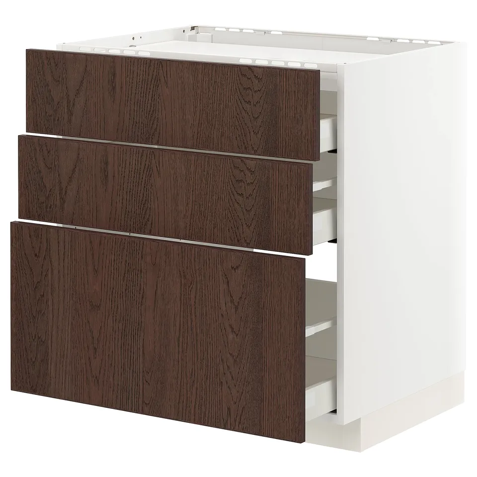 A METOD kitchen unit with three dark brown sinarp wood drawers and a white frame.