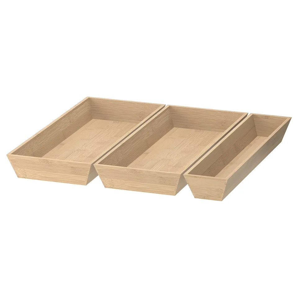 Three wooden trays, designed for organising kitchen drawers. Light brown colour, rectangular shape.