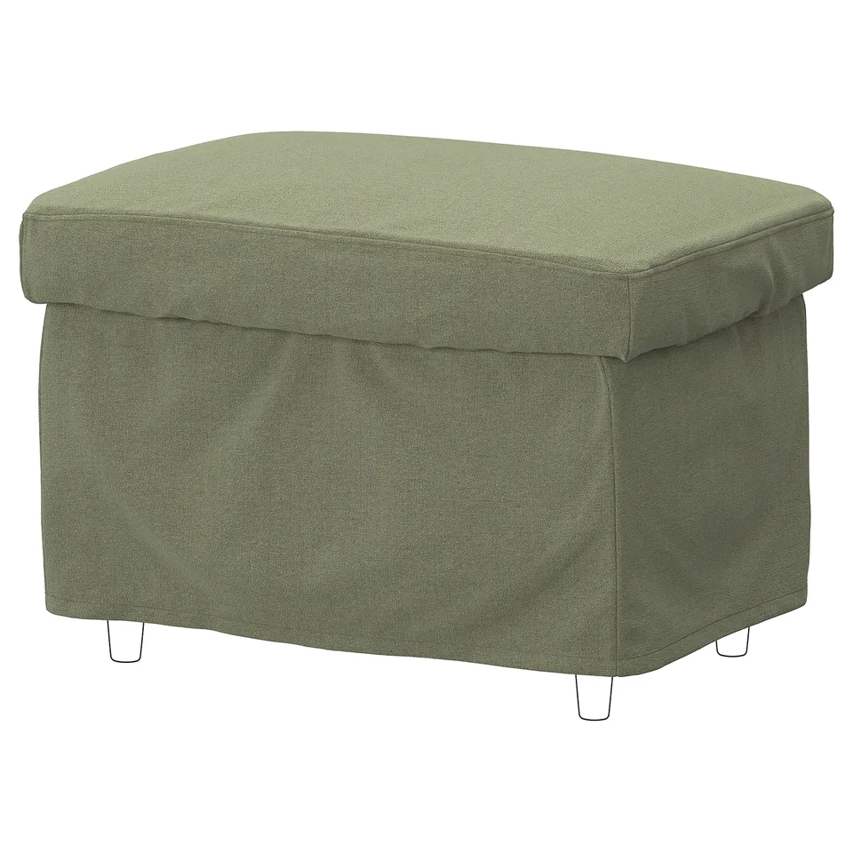 Round green STRANDMON footstool, fabric-covered with white legs.