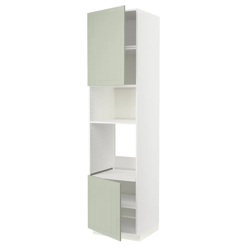 White & green METOD kitchen cabinet with two doors.