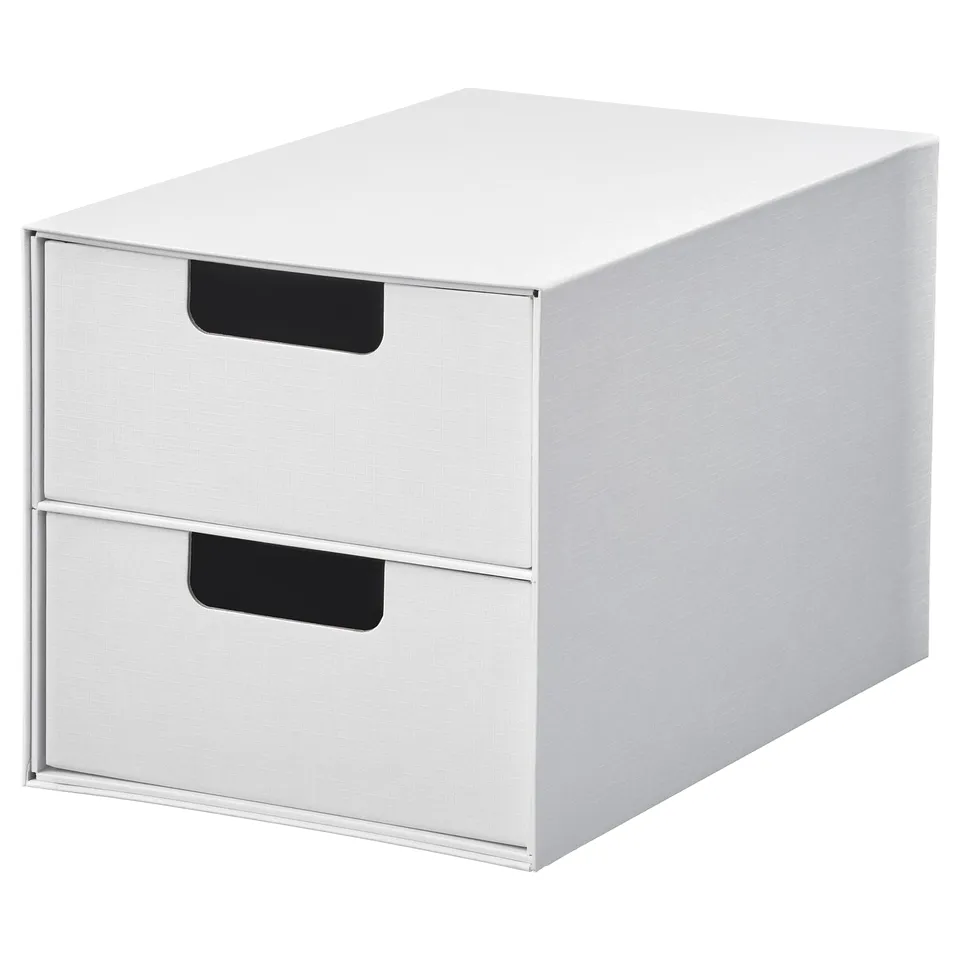 White recycled paperboard storage chest with 2 black-handled drawers.