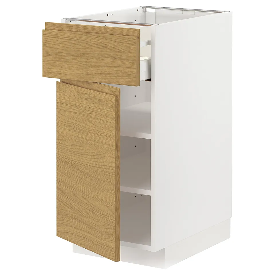 A modern, white kitchen cabinet with light wood accents, featuring a sleek design with a drawer and shelves.