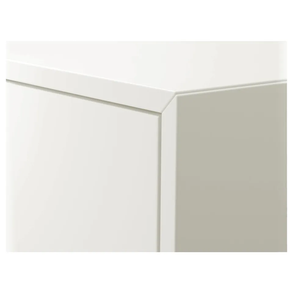 Minimalist white storage cabinet, modern design, clean edges, wall-mountable.