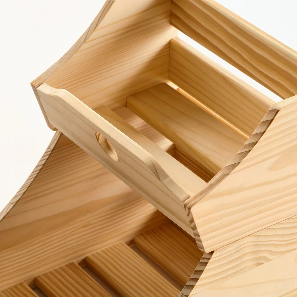 Wooden drawer unit; sturdy, natural finish; visible handles and compartments.