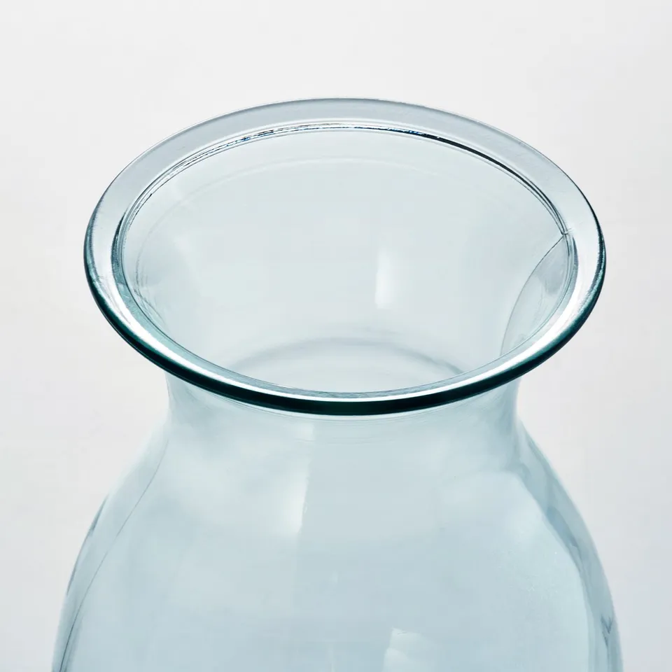 Clear recycled glass vase, wide opening, round body, smooth edges.