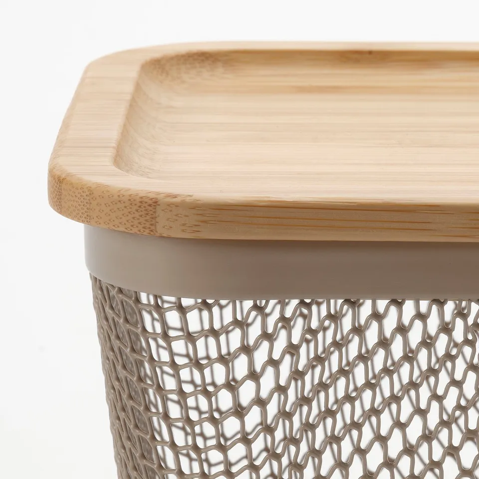 Wooden lid on textured basket.