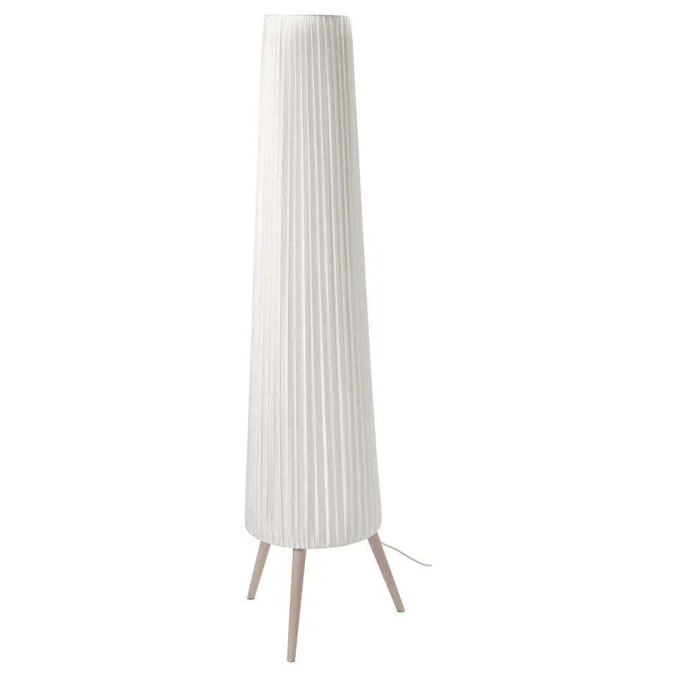 A white ÖKENSAND floor lamp with a pleated shade and three beech legs.