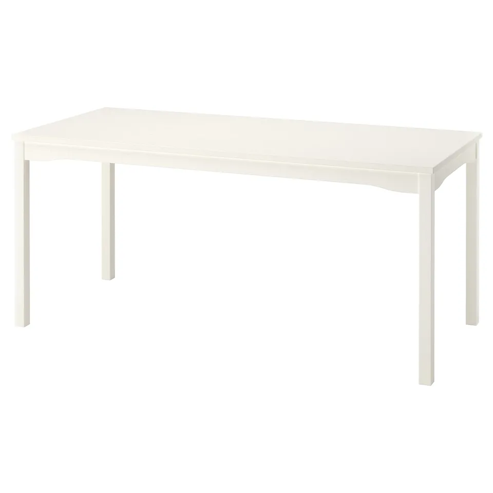 White HAUGA rectangular dining table with birch veneer and pine legs.