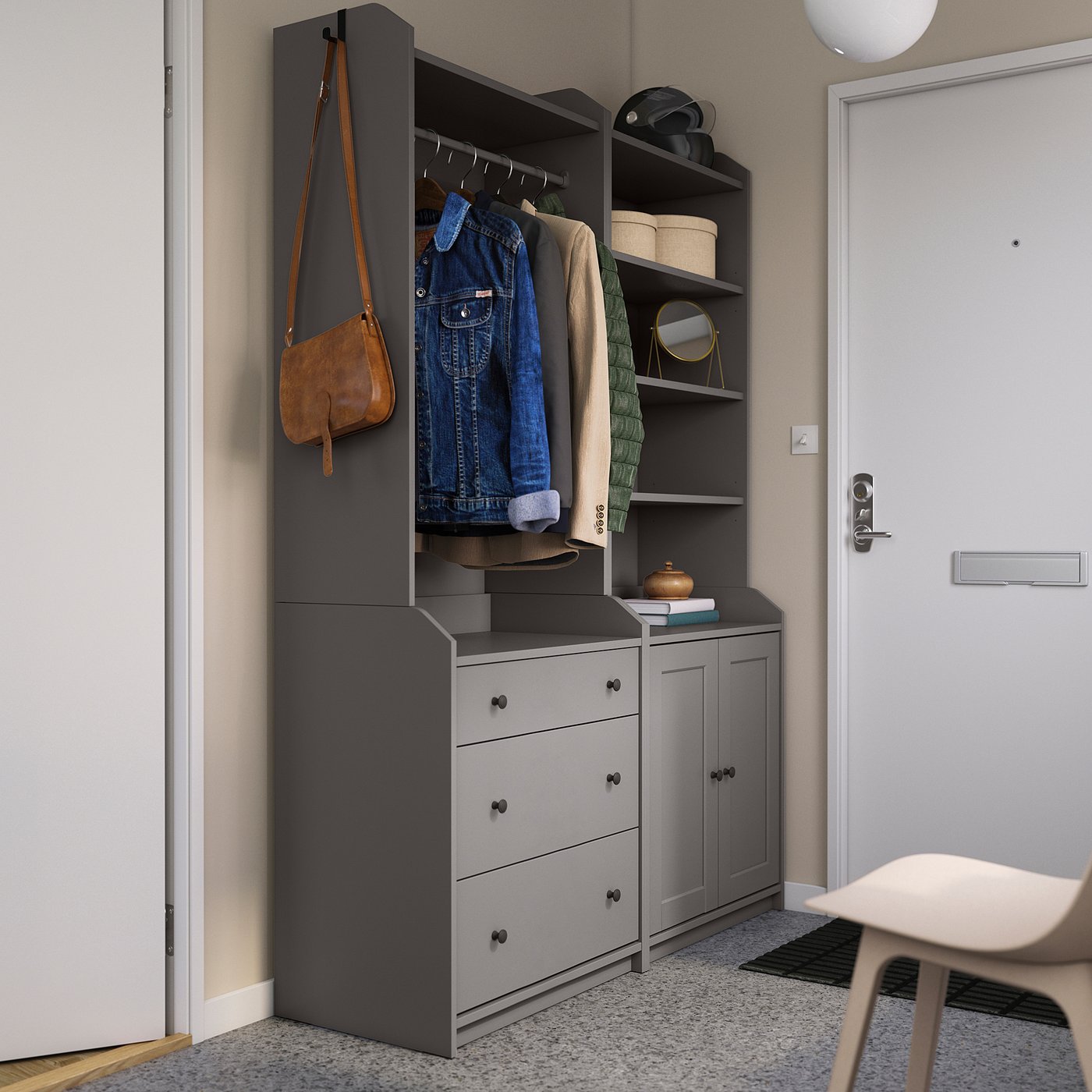 Modern entryway setup with grey HAUGA wardrobes, hanging jackets, and bags.