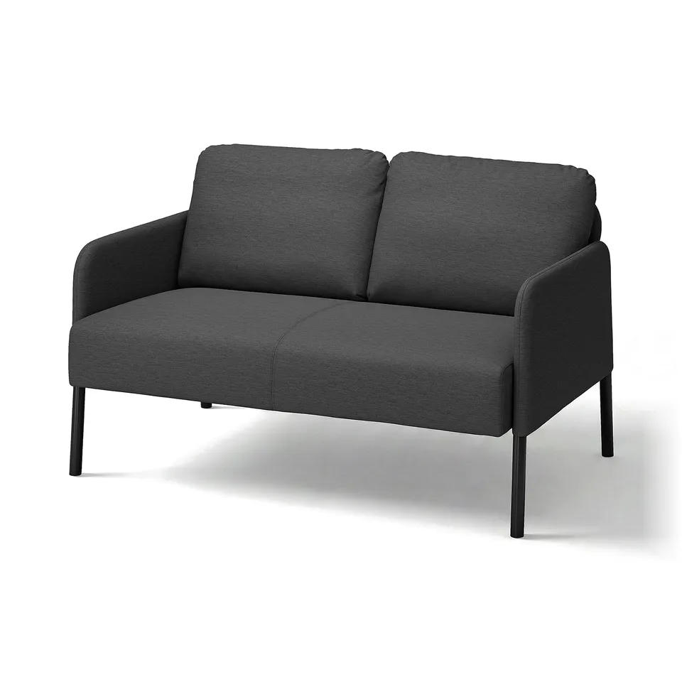 Modern compact grey sofa, GLOSTAD, with minimalist design, plush cushions, and sleek metal legs.