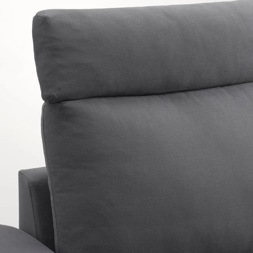 Modern sofa in grey, showcasing quality upholstery with cushioned backrest and armrest.