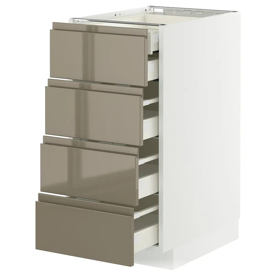 A modern kitchen cabinet set in white with metallic silver drawers.