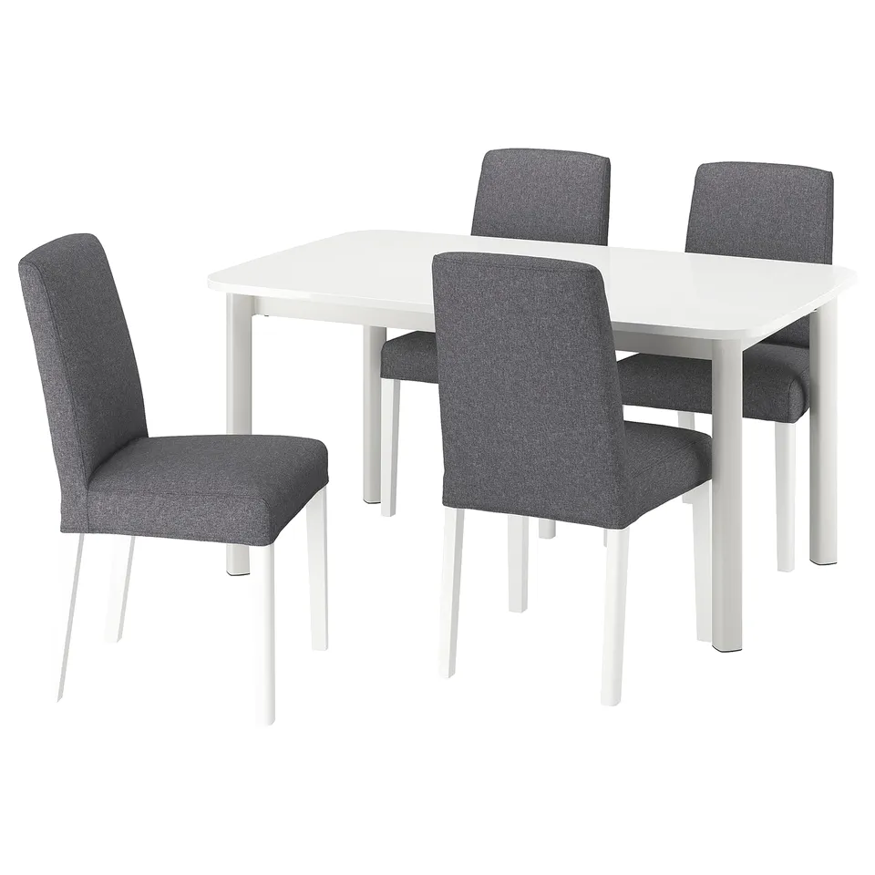 Image a white extendable dining table with four grey fabric chairs. Minimalist design, modern aesthetic. Perfect for compact spaces.