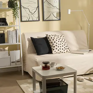 BURVIK/LYCKSELE set: 2-seat sofa-bed + side table, Ransta natural + black, Width 142 x Depth 100 x Height 87 cm