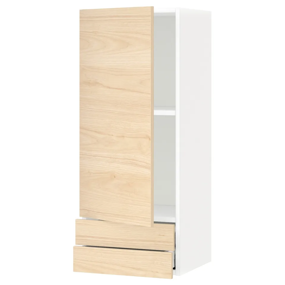METOD light wood cabinet with soft-close drawer.