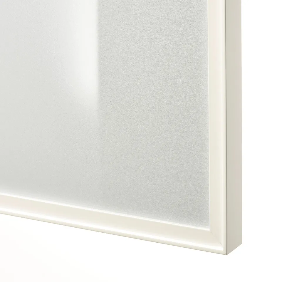 Close-up of modern, sleek HÖGBO glass door with crisp white frame, reflecting high quality craftsmanship.