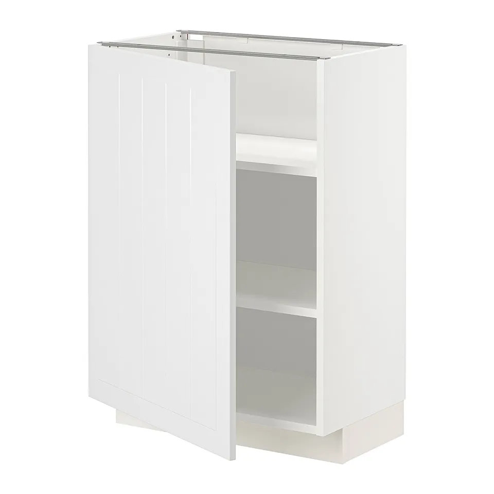A white METOD kitchen cabinet with a door open, revealing adjustable shelves inside. The cabinet a sleek, streamlined design.