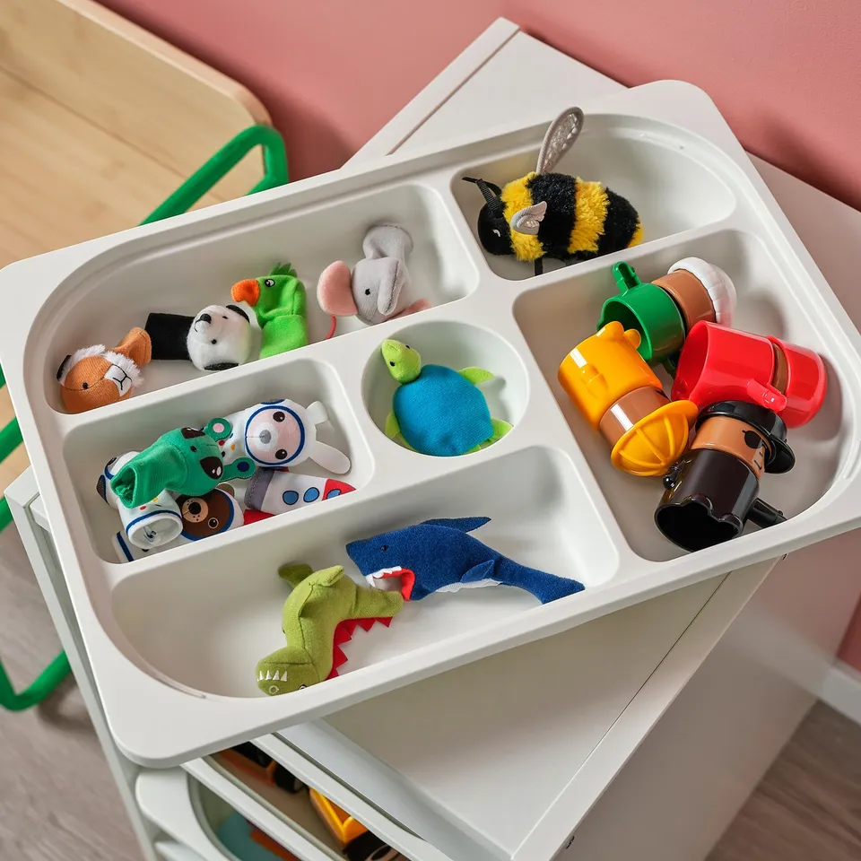 White TROFAST toy organiser with multiple compartments.