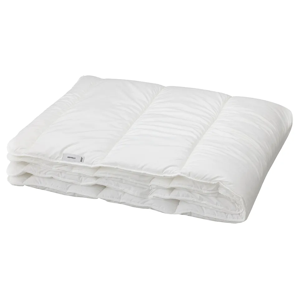 White IKEA SÄFFEROT recycled polyester duvet, folded neatly, clean design.
